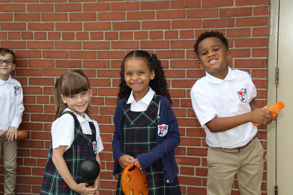 Three smiling students