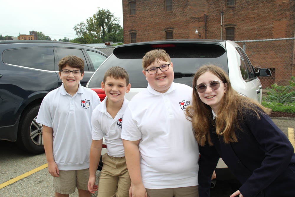 Four smiling students