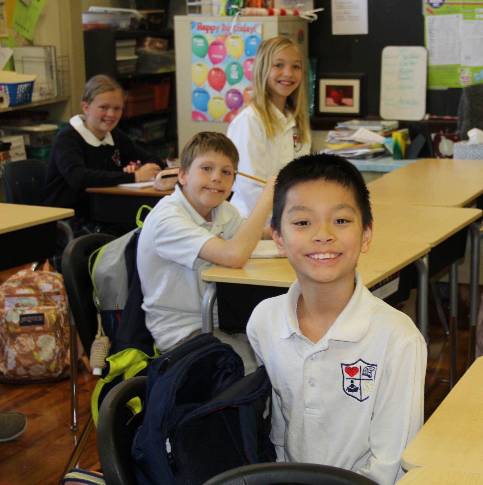 Smiling students in the classroom